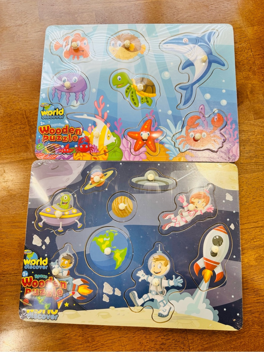 2 Wood puzzles by World Discover Toddlers 3+